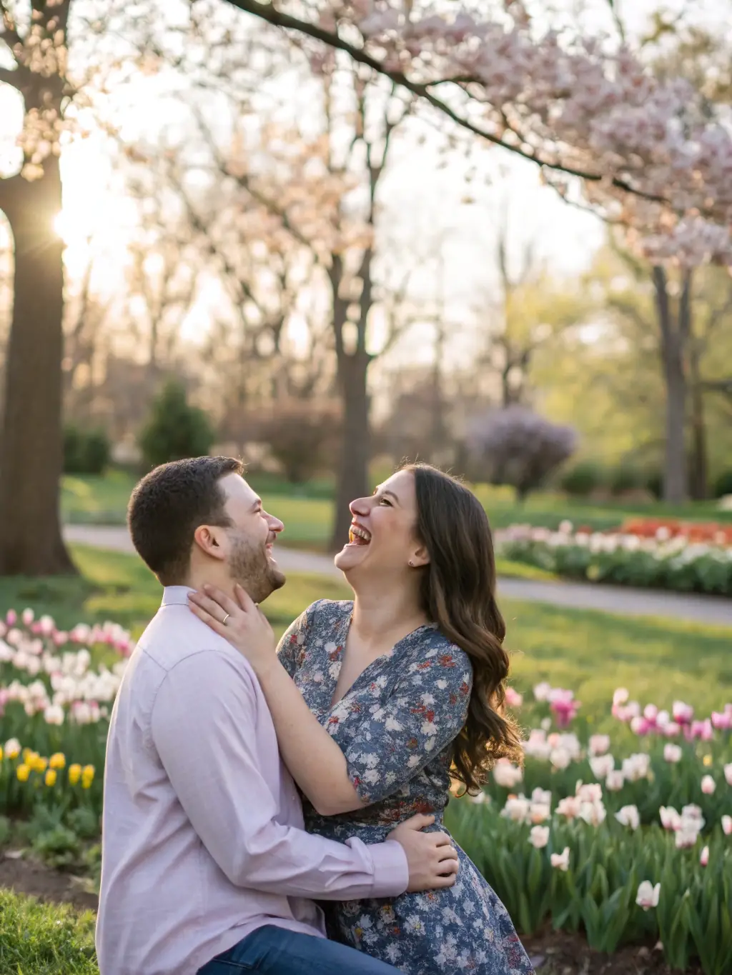 A photograph of a couple laughing together during a couples retreat, capturing the joy and reconnection experienced during The Aligned Couple's transformational retreats.